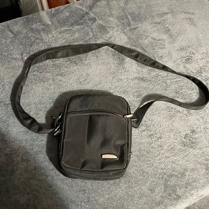 Black Travelon bag with pink inside